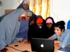 Women in the Dadaab, Kenya refugee camp receiving training to work with Samasource, a web company that outsources computer jobs to women, youth, refugees, and internally displaced people living in poverty. Photo courtesy Samasource.