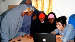 Women in the Dadaab, Kenya refugee camp receiving training to work with Samasource, a web company that outsources computer jobs to women, youth, refugees, and internally displaced people living in poverty. Photo courtesy Samasource.