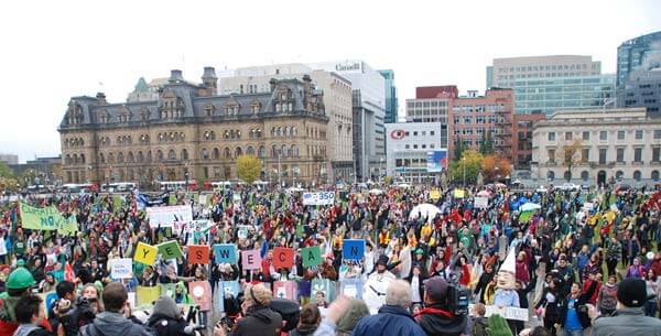 Thousands of protesters convened on Parliament hill last Sunday as part of the 350.org International Day of Action on climate change. Photo via Paul Dewar's Flickr feed.