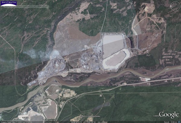 Google Earth detail showing part of the Athabasca tar sands mining operation. The tar sands is both the most carbon- and capital-intensive project on earth. Photo via Flickr user Skytruth.