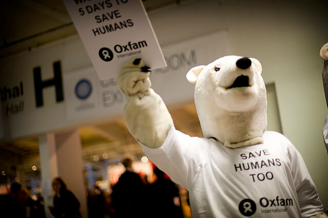 OXFAM Polar Bears demonstrate at the 2009 Climate Change Conference in Copenhagen. Photo courtesy of Oxfam International, Flickcreativecommons.